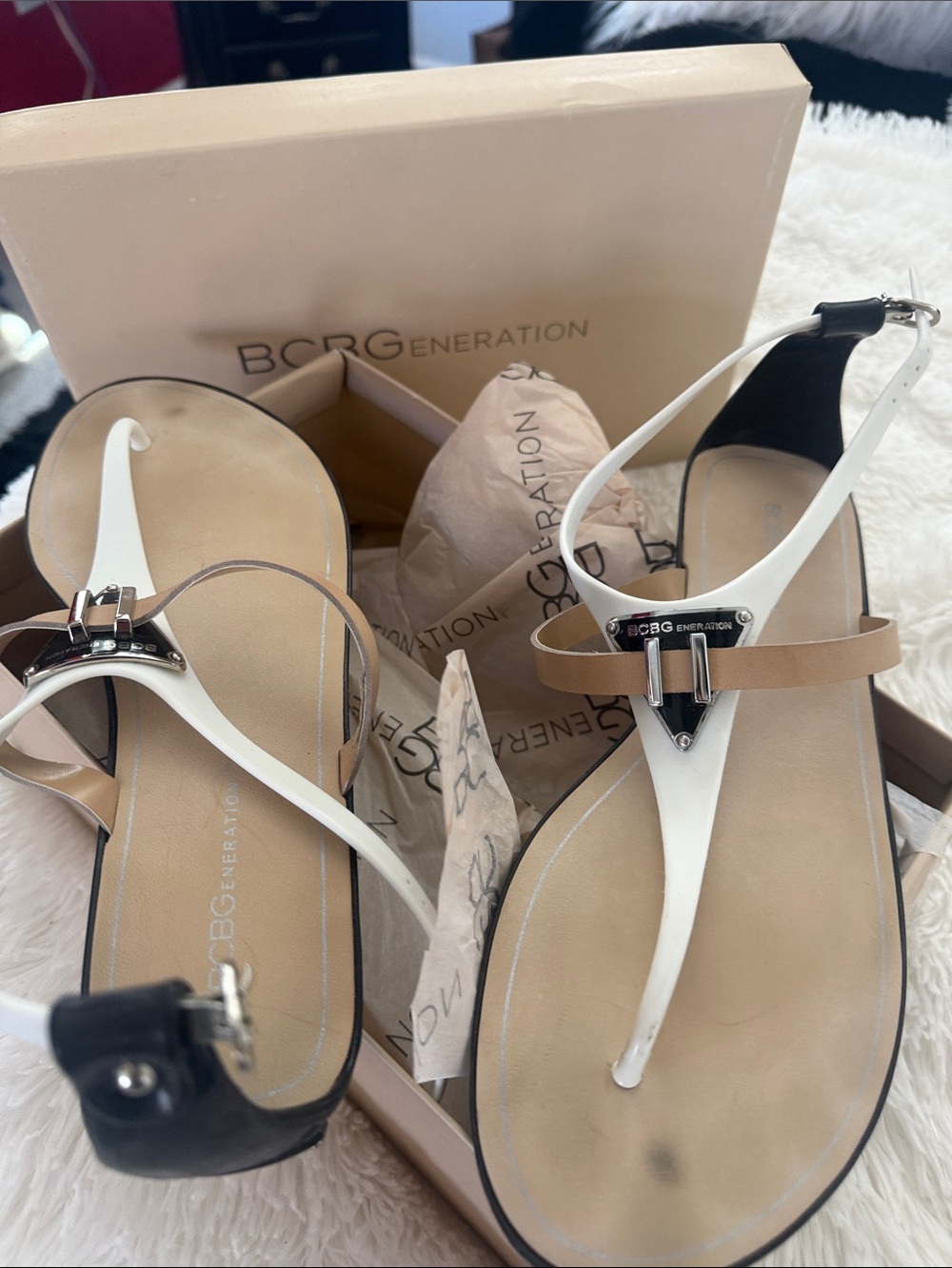 BCBGeneration White, Tan and Black T-Strap Sandals with Logo Plate